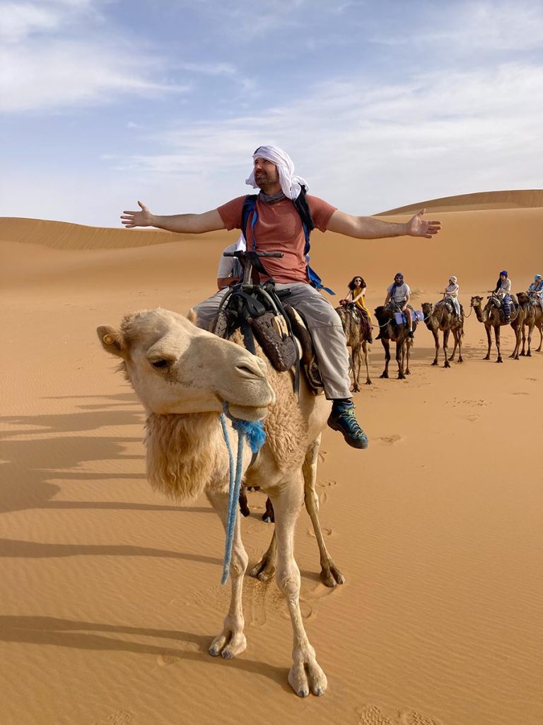 Riding a camel across the Sahara Desert